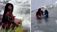 Daredevil sits at the edge of Devil's Pool in Zambia for Insta-worthy shot