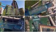 Incredible video shows people swimming in world's first transparent pool built between two skyscrapers