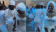 Wedding guest clings onto groom on dancefloor, refuses to let go: "She's probably a side chick"