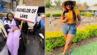 Woman celebrates law degree while holding a big sign, peeps dig the achievement: "Super proud of you"