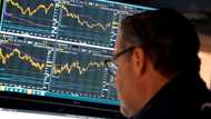 Asian markets swing as inflation, rates worry investors