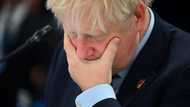 UK PM back in crisis mode after foreign tour