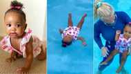"Swims better than me": A 10 month old baby girl has serious swimming skills and people take notice