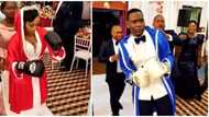 What is going on? Reactions as couple show up for their wedding reception in robes, boxing gloves