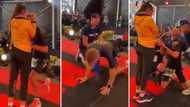 Athlete proposes at finishing line but gets leg cramp and crumbles, peeps are certain it’s a sign, lol