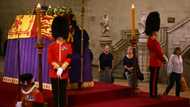 Tears as British public pays respects to queen's coffin