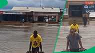 2 Limpopo Men carry 48 beers each through flooded road in TikTok video