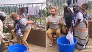 Lady gets into trouble after African mom finds her husband doing the housework while she rests, peeps amused