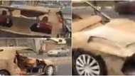 Man constructs sports car with scrap iron and carton, cruises around town in it
