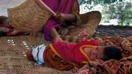 Flood-born: Nothing but mud as mother, infant return to Pakistan home