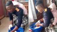 Man helps pregnant bae by baking bread with other kid on his back, TikTok users applaud him, “Indoda Emadodeni”