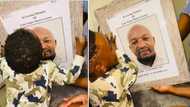 Viral video of precious little boy kissing memorial photo of his late father has Mzansi holding back tears