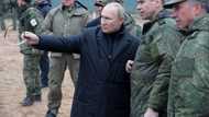 Putin visits military draft training centre