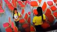 Beautiful lady with nicely braided hair steals phone in church; captured on CCTV
