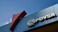 A Swiss and an Argentine were charged in Miami Tuesday with helping launder part of $1.2 billion taken from Venezuelan state oil firm PDVSA in a long-running corruption and bribery investigation.