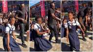 Cute school kid with flexible body takes on Usain Bolt in marathon dance, twists her body like robot in video