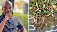 SA man shows the R2495 he managed to save from January with just spare change, peeps share their piggy banks