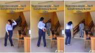 Pretty lady in long sleeves shows off sweet dance moves at office, her male boss catches her in video