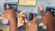 Woman with super long nail extensions has hard time using ATM, Mzansi cracks jokes over her struggle