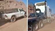 A Toyota Hilux's power and traction were all that was needed to tow a massive 12 wheeler truck out of trouble