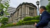 Asian markets fall again as traders eye more rate hikes
