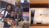 Boy's priceless reaction to gift of PS5 from dad trends online