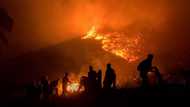 Firefighters work all night to contain fires on the slopes of Paarl Mountain