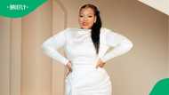 Anele Mdoda shows off her stunning curves in showstopper black dress