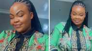 Curvy lady slays in Versace shirt and dances to AKA's 'Fela In Versace' in tribute