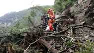 Downpours and mudslides hamper China earthquake rescue mission