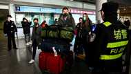 China lifts sweeping visa curbs on foreigners