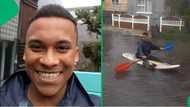 "Why are we like this?": Singing Cape Town man rows in flooded street, Mzansi laughs