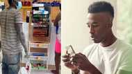 Photo of hardworking man buying his bae new shoes has Mzansi gents pressed: "She'll still cheat"
