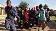 Bizarre video of people being chased by man in cultural attire in village leaves SA confused and entertained