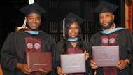 Proud father and two children bag master's degrees from university, people clap for their huge achievement