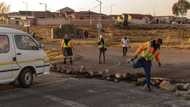 Mogale City shutdown: Protest action leaves 1 dead, residents burn shacks while hunting down illegal miners