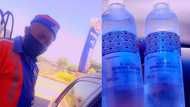 Kind petrol attendant buys lady water after she couldn't afford it in