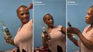 Video of lady singing and jiving with whiskey booze bottle is a whole vibe, leaves Mzansi entertained