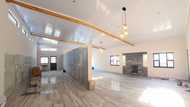 Mzansi lady celebrates nearing end of building beautiful dream home