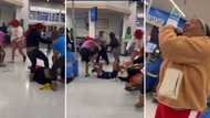 Massive fight breaks out at shopping store with men & women attacking each other