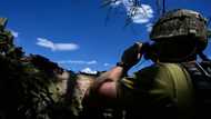 In east Ukraine trench, soldiers dig in for 'total war'