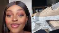 Bae surprises girlfriend with expensive shoes, Mzansi reacts: "Sbwl"