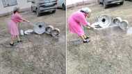 Makoti creatively washes pots with hosepipe, Mzansi can't deal with how hilarious the whole thing is