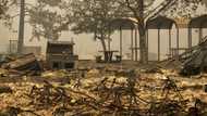 Firefighters race to protect California town threatened by wildfire