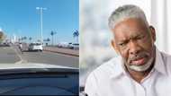 Woman trying to get run over by speeding cars in bizarre video has Mzansi appalled, "She’s even practising the jump bandla"