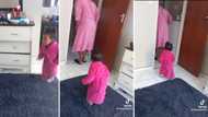 Cute toddler mirrors grandmother's slow walk, video of duo wearing matching pink gowns amuses SA