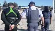 Video: Surfer nabbed by SAPS on Cape Town beach amid lockdown ban