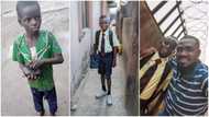 Nigerian man adopts kid off street, shares transformation photo 1yr after, puts him in school