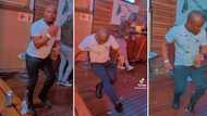 TikTok video of Mzansi man with strong knees performing impressive dance moves at groove in tight jeans