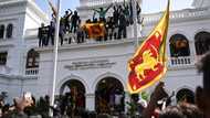 Sri Lankan troops stand by as protestors occupy PM's office